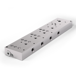 SKF Grundplatte mit Erweiterung zur Montage eines elektrischen Umsteuerventils und Ölfilters - Für 1-6 Mengenbegrenzer SP/SMB10